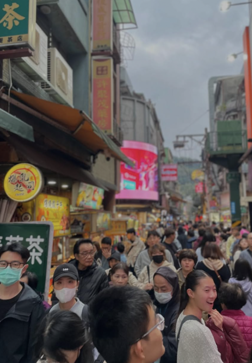 Orchestra students tour Shilin Night Market.